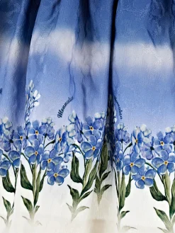 Abito matelass&eacute; con gonna florale