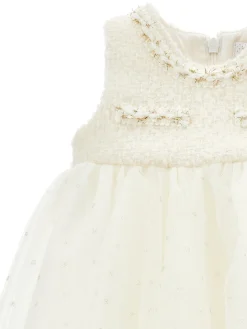Abito smanicato tulle e boucl&eacute;