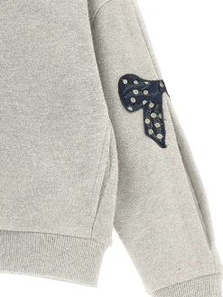 Felpa lurex con fiocchi