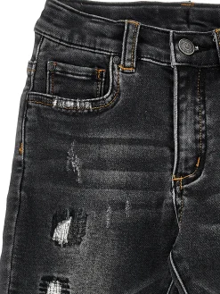Pantaloni denim con effetto usura