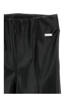 Pantaloni tessuto spalmato con spacchi