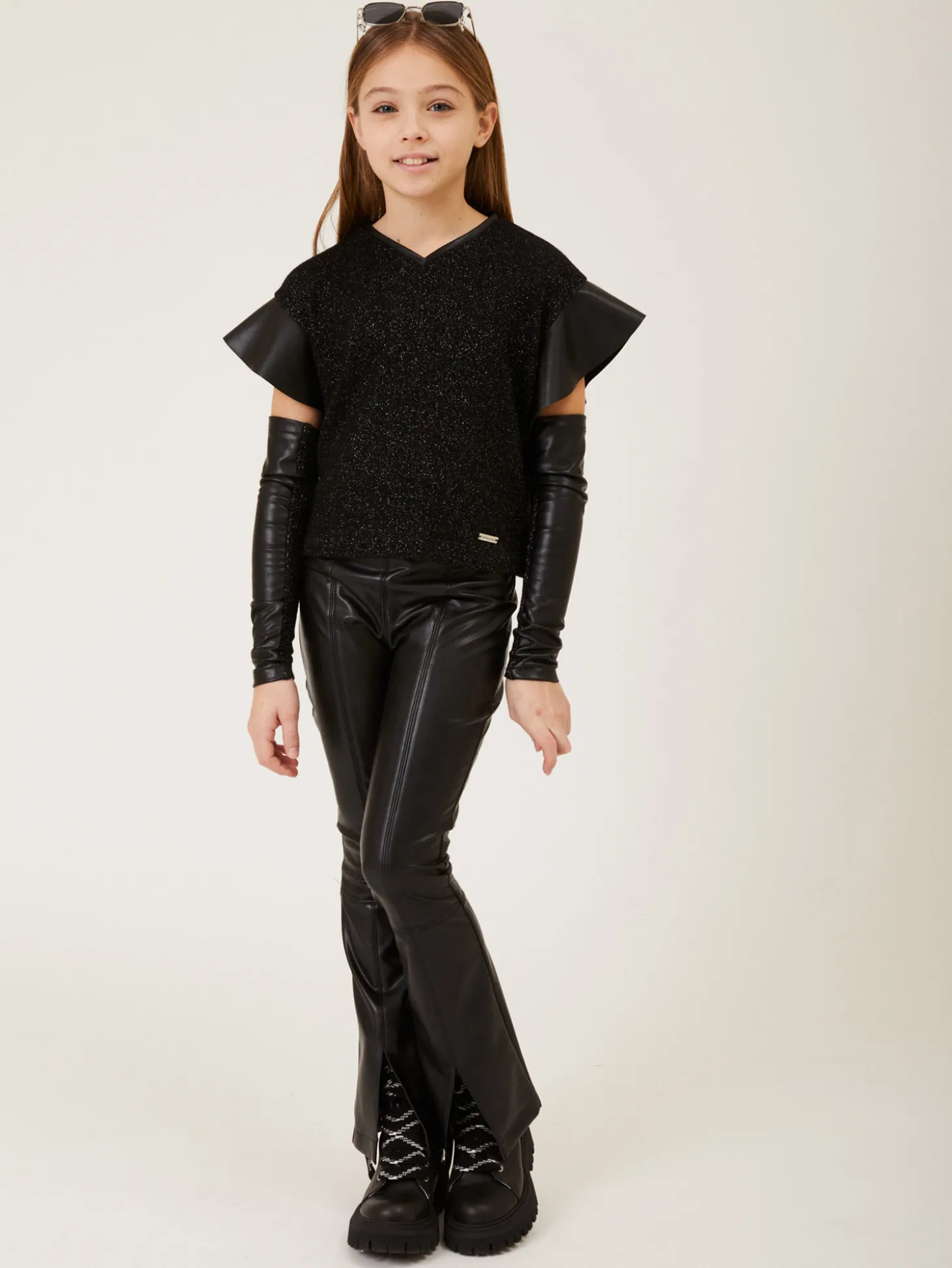 Pantaloni tessuto spalmato con spacchi